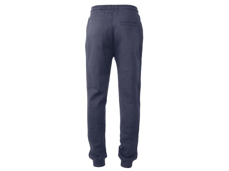 Donkerblauwe joggingbroek.