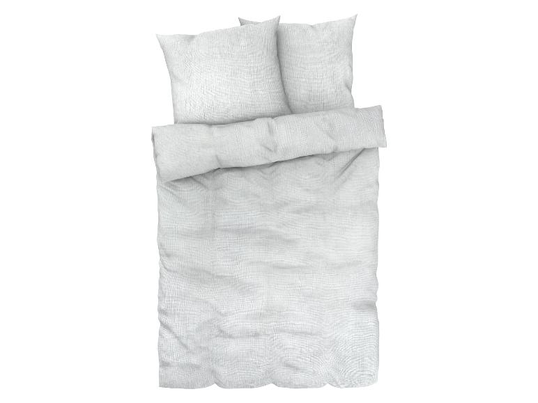 Wit beddengoed met kussens
