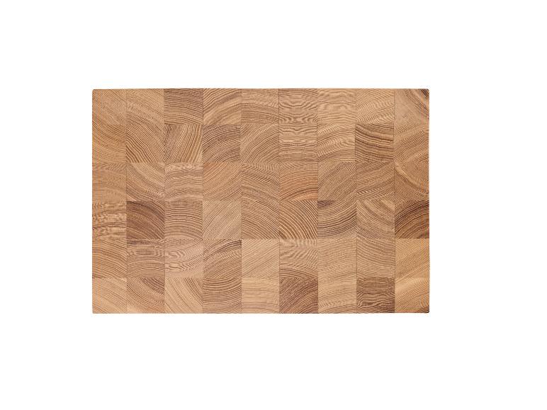 Houten snijplank met end-grain constructie en zichtbare jaarringen.