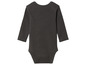 Een donkergrijze baby romper met lange mouwen.
