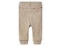 Beige babybroek met hoge taille en elastische boorden.