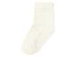 Effen crèmekleurige sok met een geribbelde textuur