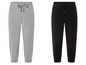 Twee paar joggingbroeken, een grijze en een zwarte.