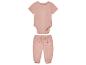 Baby roze romper en broek van mousseline.