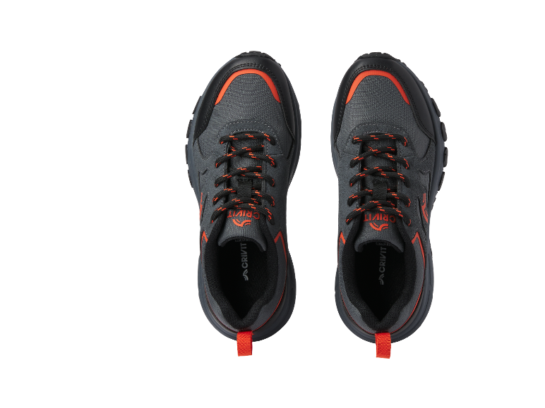 Paar Crivit sportschoenen, grijs en oranje.