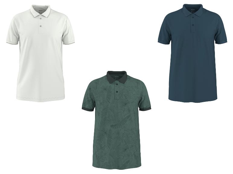 Drie poloshirts: wit, groen met bladpatroon en donkerblauw.