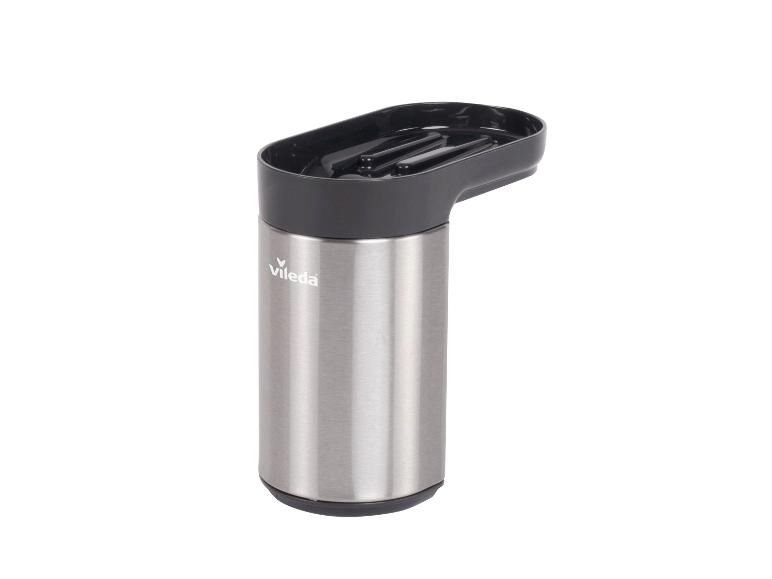 Roestvrijstalen vloeibare zeepdispenser met een zwarte lekbak.