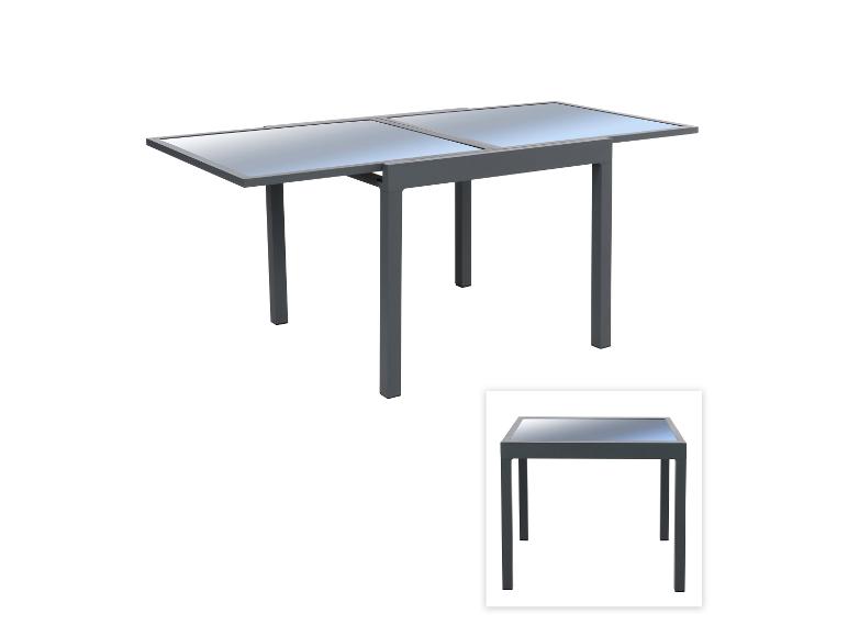 Uitschuifbare tuintafel met donkergrijs frame en twee glazen bladen, getoond uitgeschoven en compact.