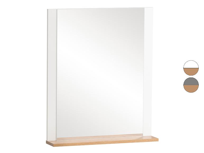 Rechthoekige wandspiegel met wit frame en lichte houten plank.