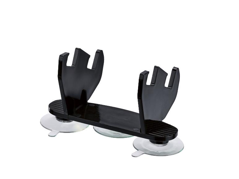 Zwarte zuignap houder voor make-up kwasten.