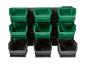 Wandorganizer met negen groene en zwarte opbergbakken.