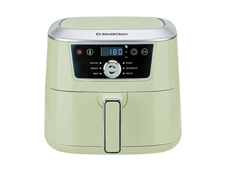 Lichtgroene airfryer met digitaal display dat 180 graden Celsius en diverse kookfuncties toont.