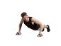 Man doet push-ups met push-up handvatten