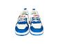Blauwe en witte kindersneakers met klittenband en veters