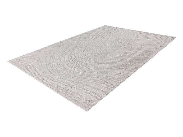 Lichtgrijs rechthoekig vloerkleed met een abstract golvend patroon.