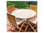 Teakhouten tuinset met tafel en stoelen.