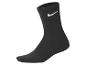 Zwarte sok met wit Nike-logo.