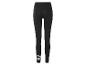 Zwarte dameslegging met een wit logo op de linkerpijp