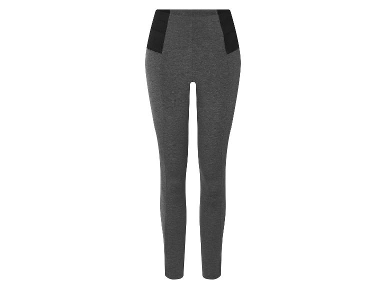 Grijze leggings met zwarte details.