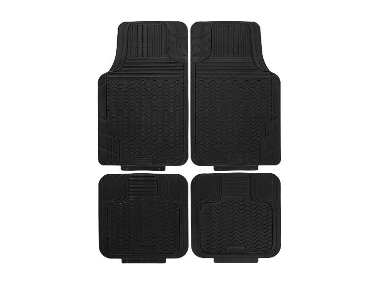 Set van vier zwarte rubberen automatten met antisliptextuur.