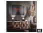 Lijst met tekst 'Light. Inspired by life.' op een donkere muur, met een houten dressoir en planten.