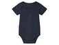Een donkerblauw babypakje met korte mouwen.