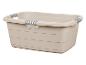 Beige wasmand met handgrepen.