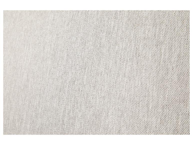 Detail van lichtgrijze stof met zichtbare textuur