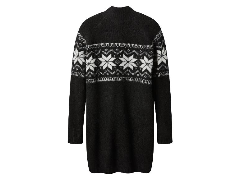 Zwarte trui jurk met witte sneeuwvlok en geometrische patronen.