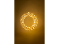 Gouden LED-lichtslinger in ringvorm, hangend aan het plafond.