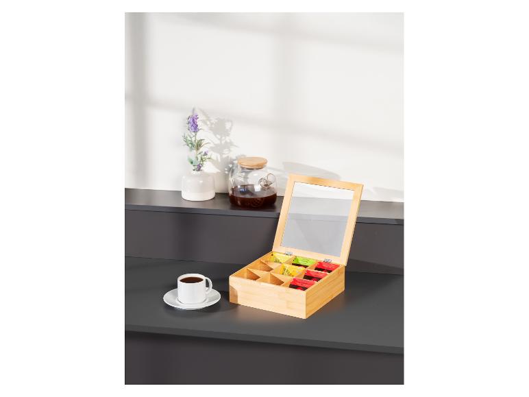 Bamboe theedoos met kopje en theezakjes.