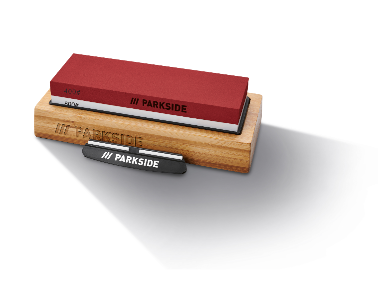 Een houten standaard met twee Parkside slijpstenen en een staal.