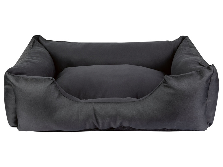 Een zwarte hondenmand met een verhoogde rand.