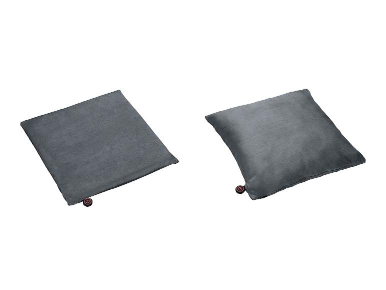 Twee grijze kussenslopen.