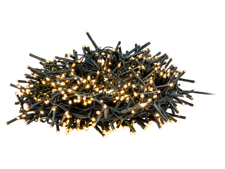 Kerstverlichting met warmwitte LED-lampjes tegen een donkere achtergrond
