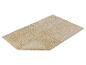 Zachte, beige badmat.