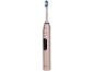 Roze elektrische tandenborstel met opzetborstel