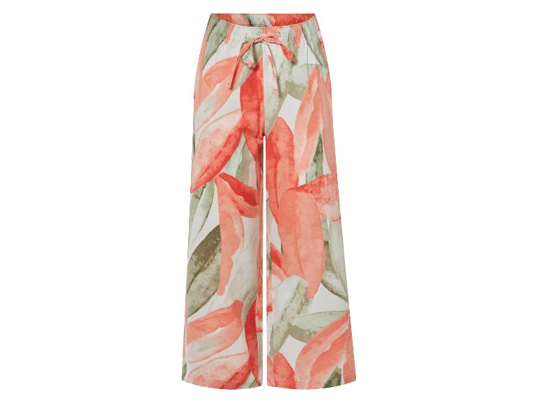 Wijde broek met bloemenprint in koraal en groene tinten.