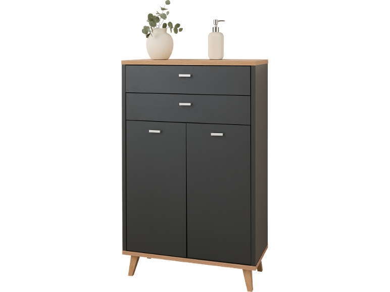 Zwarte kast met lades en deuren, met houten blad en poten, versierd met een vaas en zeepdispenser.