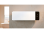 Moderne wandgemonteerde badkamerkachel met digitaal display in een minimalistische badkamer