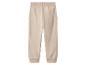 Beige kinder joggingbroek met geribbelde tailleband en manchetten.