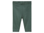 Donkergroene leggings voor baby's.