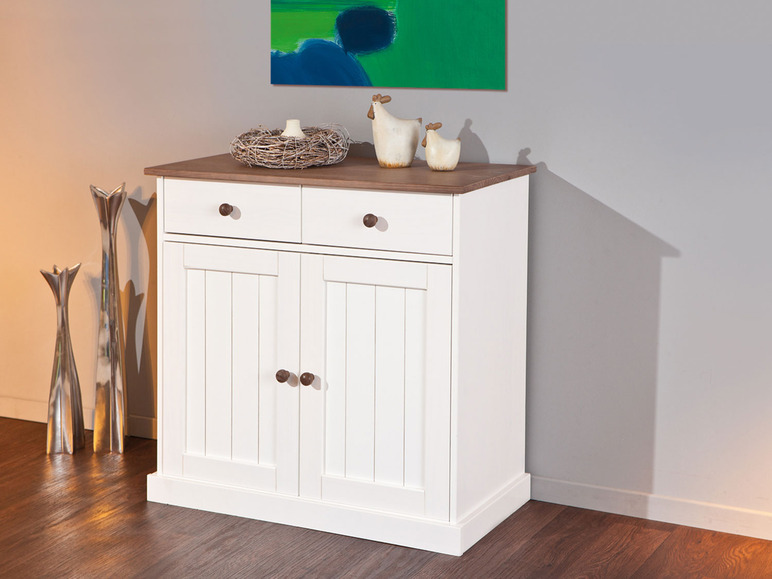 Witte kast met twee deuren en twee laden.