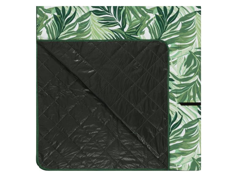 Gedempt picknickkleed met tropisch groen bladmotief.