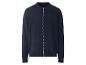 Donkerblauw gebreid vest met rits op een witte achtergrond.