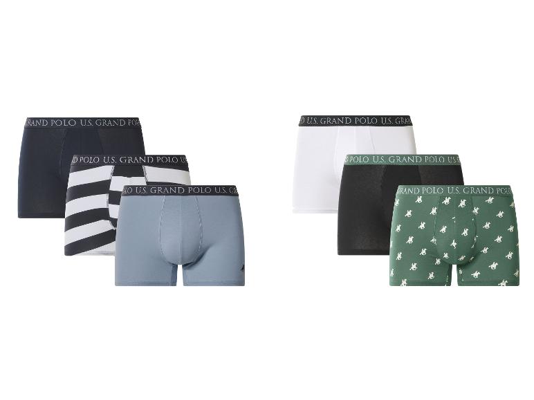 Verpakking van 6 heren katoenen boxershorts in zwart, wit, grijs, gestreept en groen met patroon.