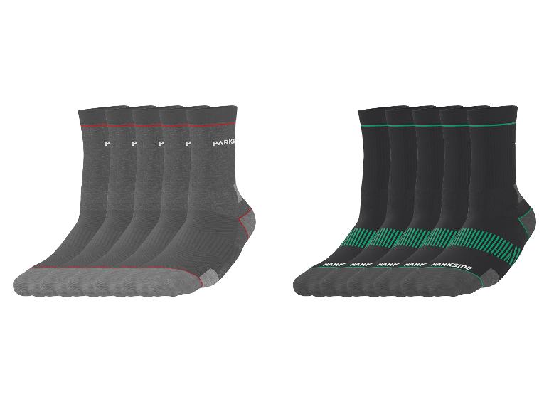 Verpakkingen van zes grijze en zwarte Parkside sokken met kleuraccenten.