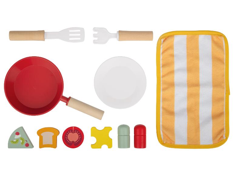 Keuken speelgoed met pan, bord en accessoires.