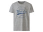 Een grijs T-shirt met een vintage 'Manhattan' print.