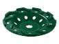 Een groene schuur- of slijpschijf met gaten